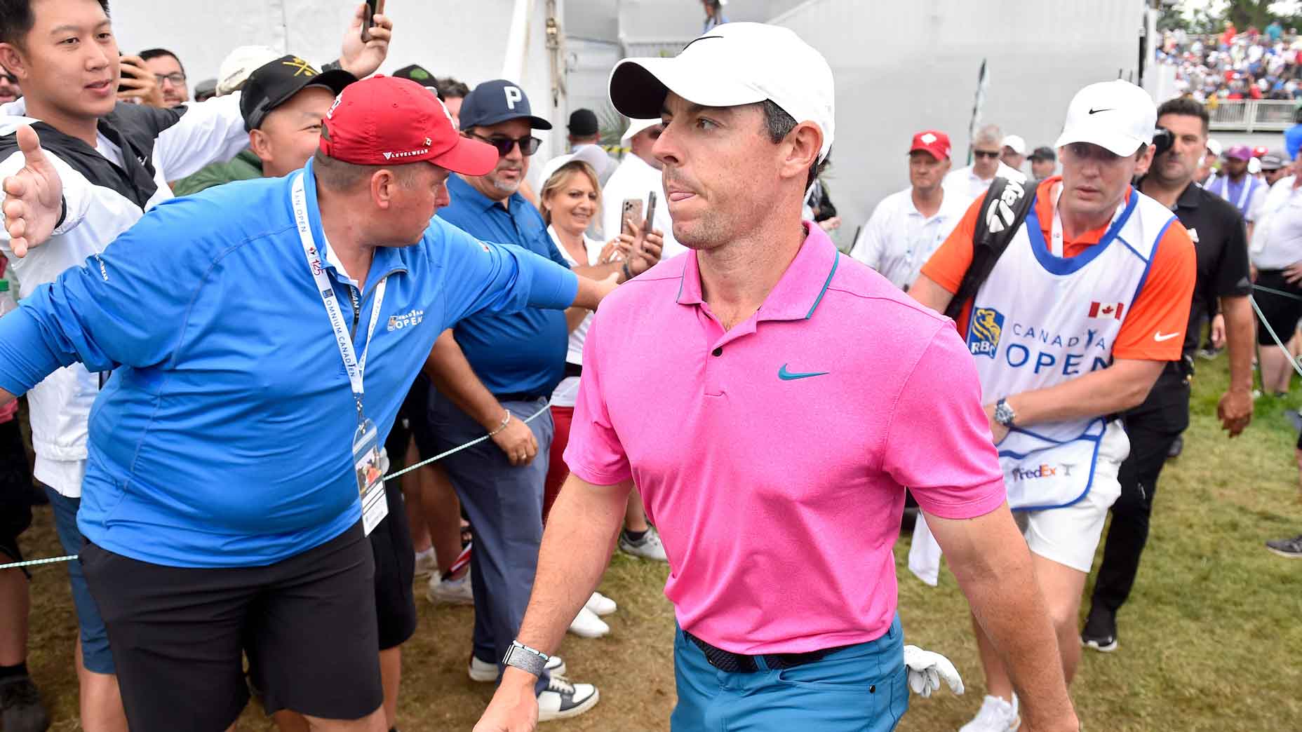 Rory McIlroy walks past fans during the 2022 RBC Canadian Open