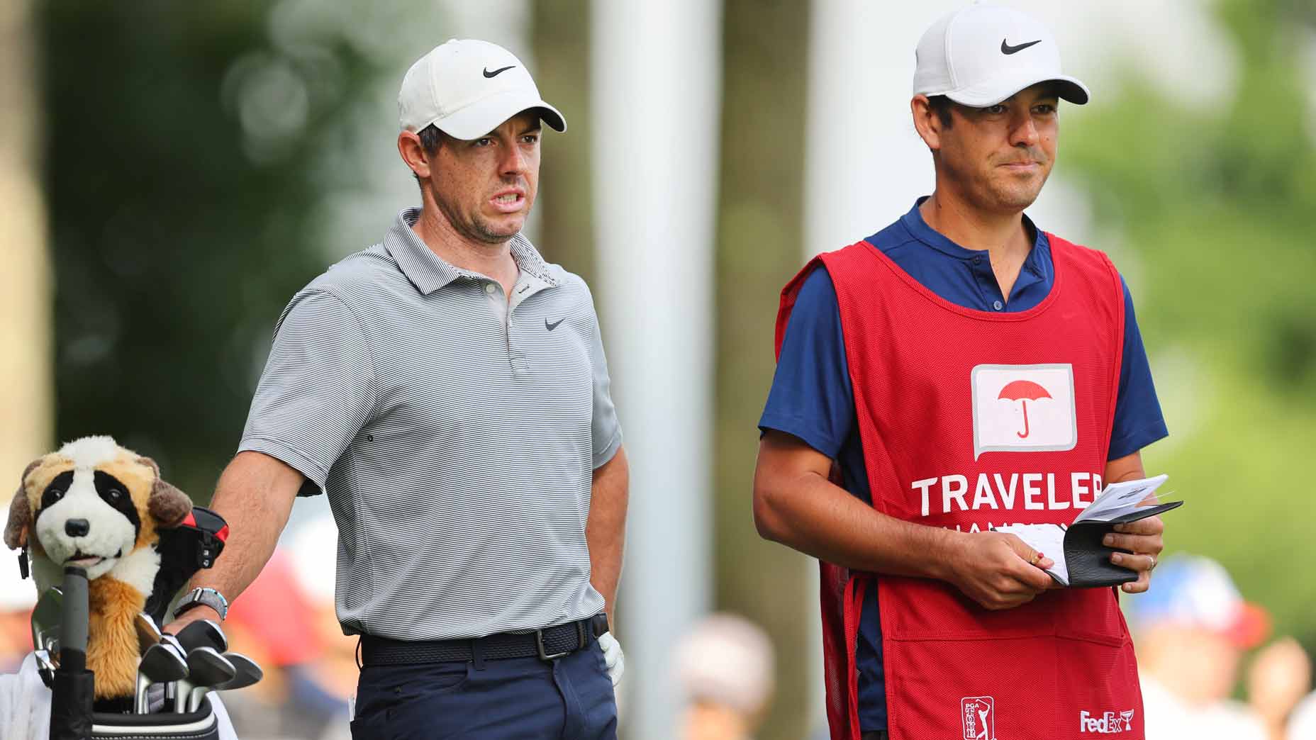 Rory McIlroy and caddie at 2022 Travelers Championship