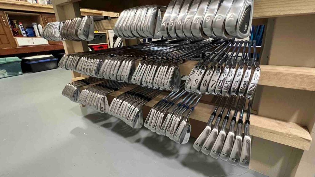 Rack of used clubs - irons