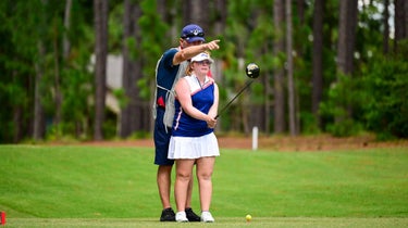 amy bockerstette and joe bockerstette line up tee shot