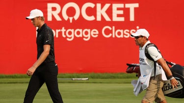Cam Davis walks course with caddie at 2021 Rocket Mortgage Classic