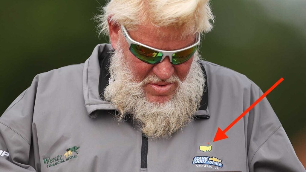 john daly with masters logo at 2022 open championship