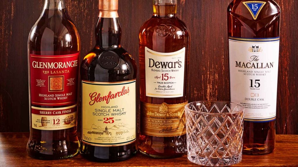 Dewar's scotch and other bottles of scotch