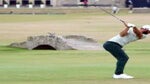 dustin johnson swings on 18 at st. andrews in 2022 open championship