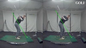 A golfer takes a swing at GOLFTEC.