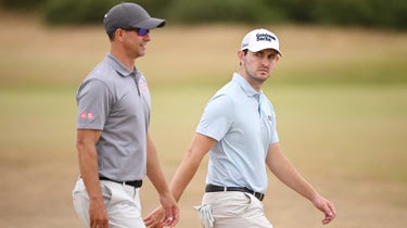 Adam Scott and Patrick Cantlay walk couse during 2022 Open Championship