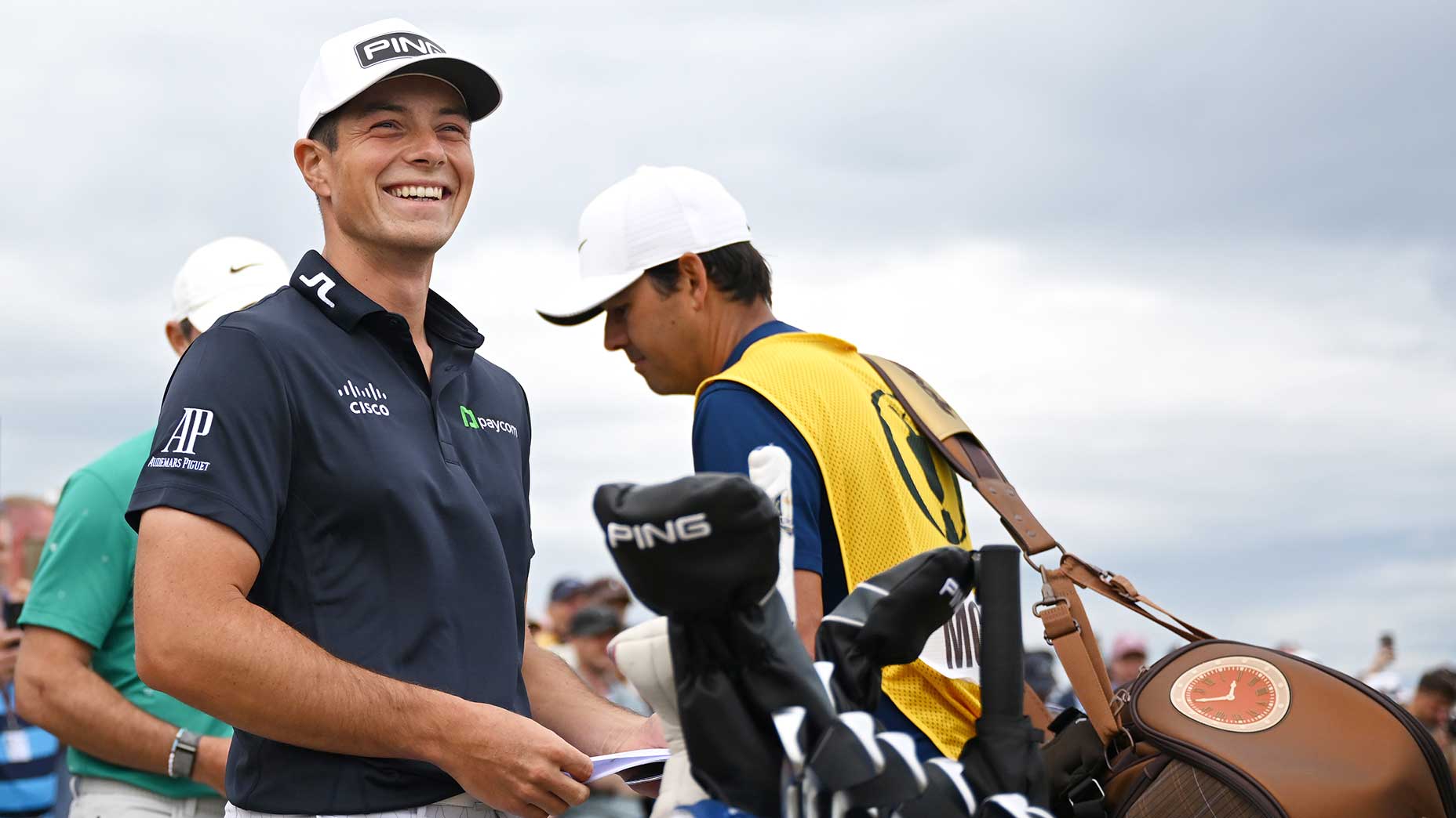 Viktor Hovland smiles during the third round of the open championship.