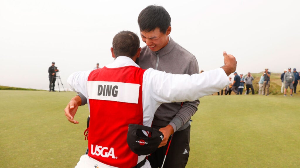Wenyi Ding embraces caddie after winning 2022 U.S. Junior Amateur