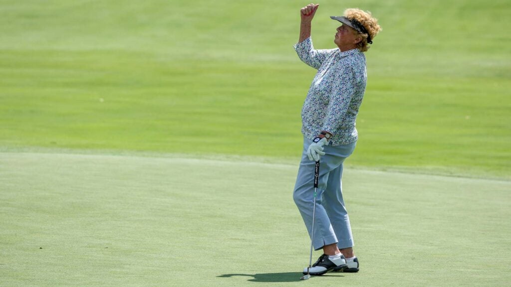 JoAnne Carner reacts to a putt on the 18th hole (she shot her age, 83) during the first round of the 2022 U.S. Senior Women's Open at NCR Country Club in Kettering, Ohio.