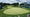 Spectators watch golf at the 18th hole of Wilmington Country Club