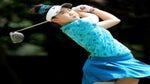 Lucy Li takes a swing.