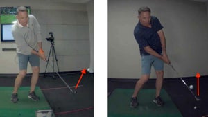 Golfer demonstrates swing fault during lesson