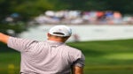 Pro golfer points left to warn of bad tee shot