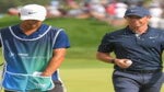 Rory McIlroy walks with caddie at 2021 BMW Championship