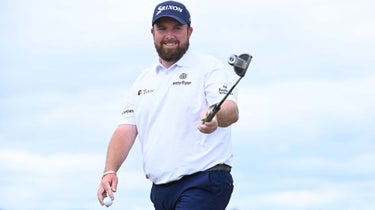 Shane Lowry raises his putter at the 2022 Open Championship