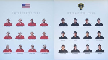 Signs display photos of the US and international teams ahead of the 2022 Presidents Cup at Quail Hollow Country Club on September 19, 2022 in Charlotte, North Carolina.