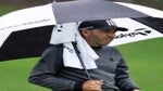 Sergio Garcia of Spain looks on from under their umbrella on the 4th hole during Day One of the BMW PGA Championship at Wentworth Golf Club on September 08, 2022 in Virginia Water, England.