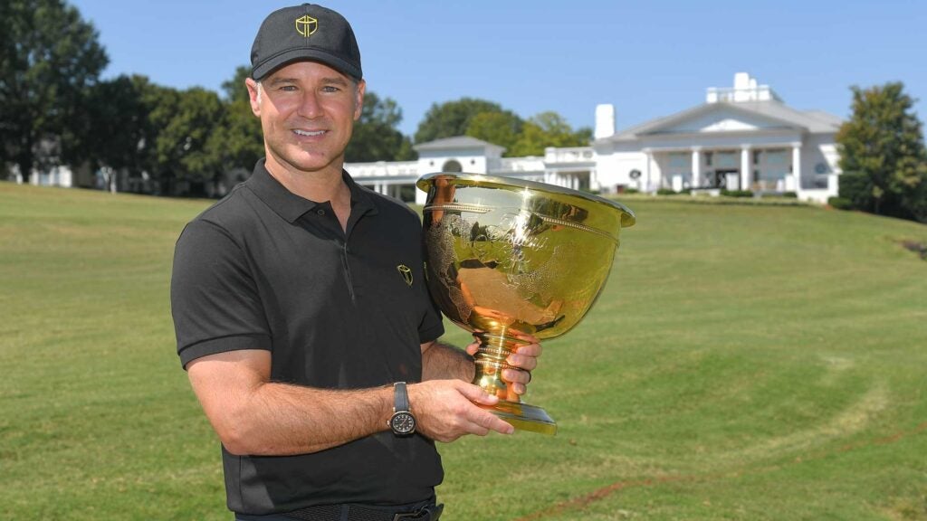 Trevor Immelman poses with the Presidents Cup during the Captains Visit for 2022 Presidents Cup at Quail Hollow Club on September 28, 2021 in Charlotte, North Carolina.