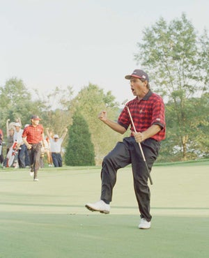 Fred Couples celebrates at the 1996 Presidents Cup.
