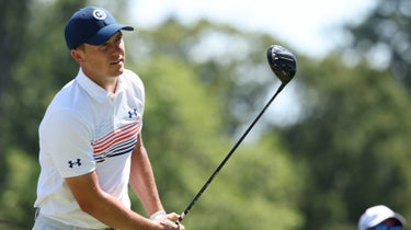 Jordan Spieth watches a tee shot.