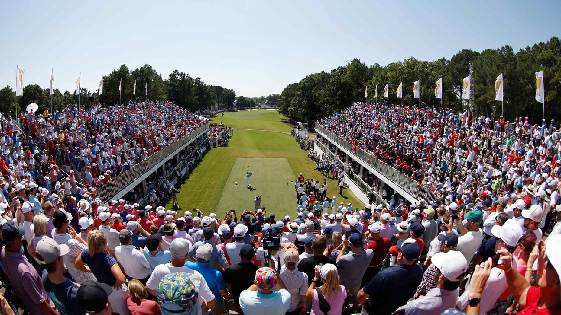 Fans crowd the 1t tee at Quail Hollow during Friday play at the 2022 Presidents Cup