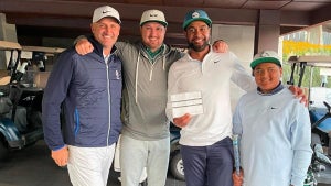 Tony Finau poses for picture after round of 60