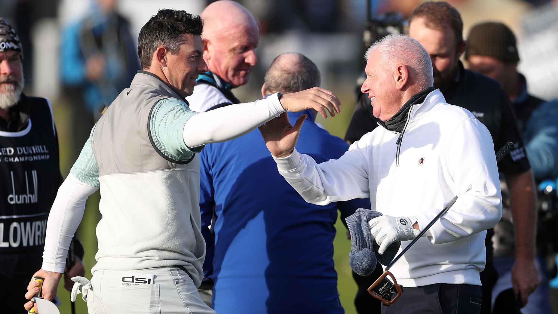 Rory McIlroy’s dad mishits, and hot mics DO NOT miss his 2-word reaction