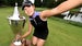 Andrea Lee takes selfie with Portlant Classic trophy on golf course