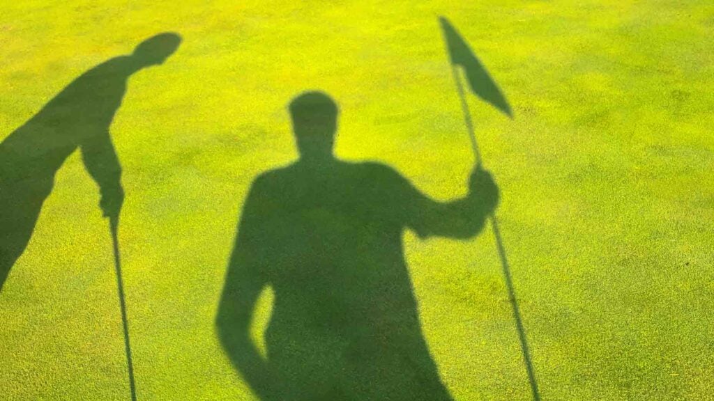 Caddie shadow on green