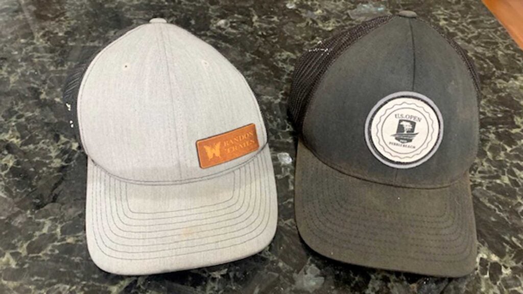 two golf hats