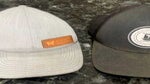 two golf hats