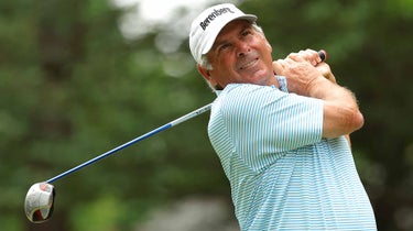 Fred Couples watches a shot