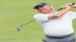fred couples hitting an iron
