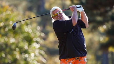 John Daly produces drive during 2022 Land Energy Charity Classic