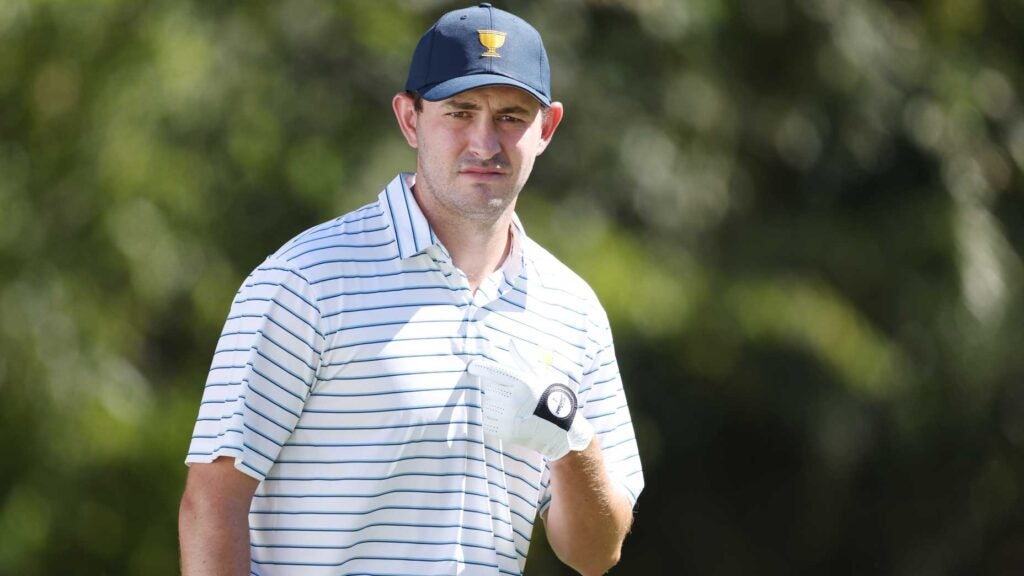 Patrick Cantlay points to himself during 2022 Presidents Cup