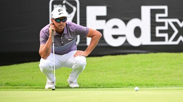 Rickie Fowler reads a putt during the second round of the Zozo Championship.