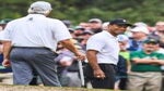 Tiger Woods smiles at Fred Couples at 2022 Masters