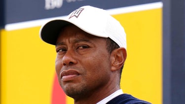 Tiger Woods stares down the tee at the 2022 Open Championship