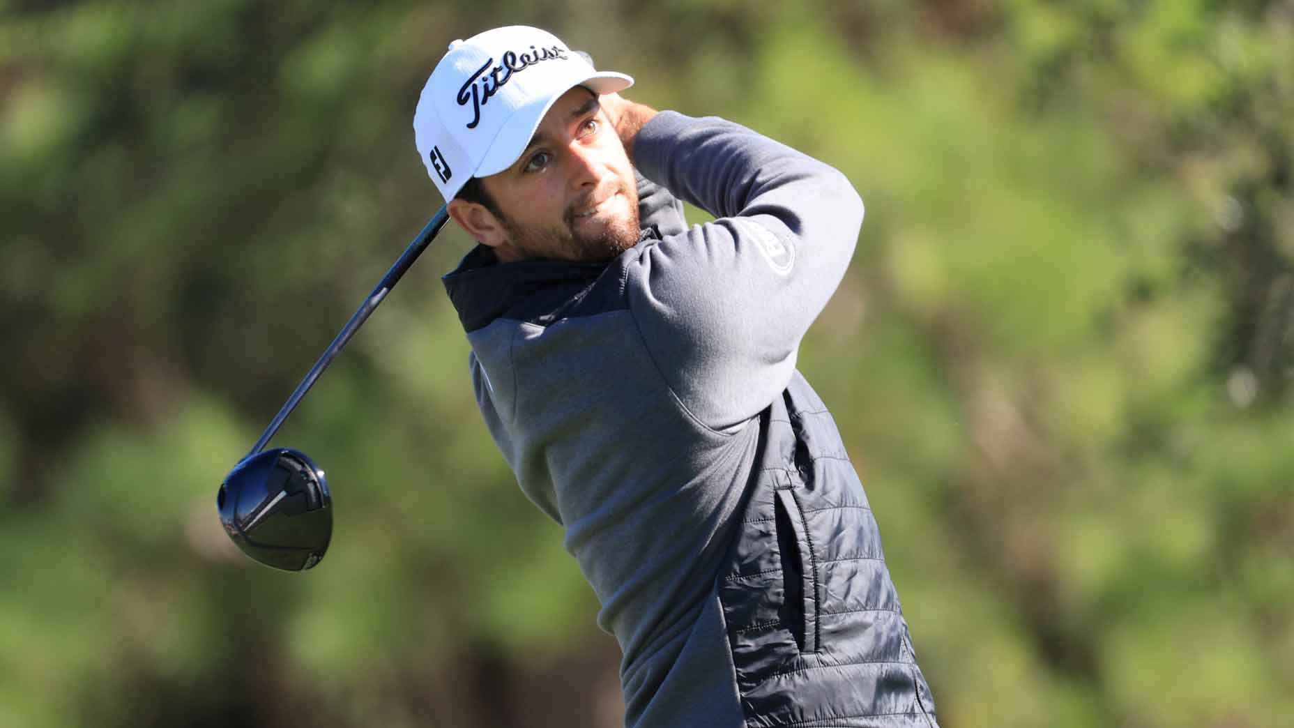 Davis Riley of the United States plays his shot from the first tee during the third round of the Cadence Bank Houston Open at Memorial Park Golf Course on November 12, 2022 in Houston, Texas.