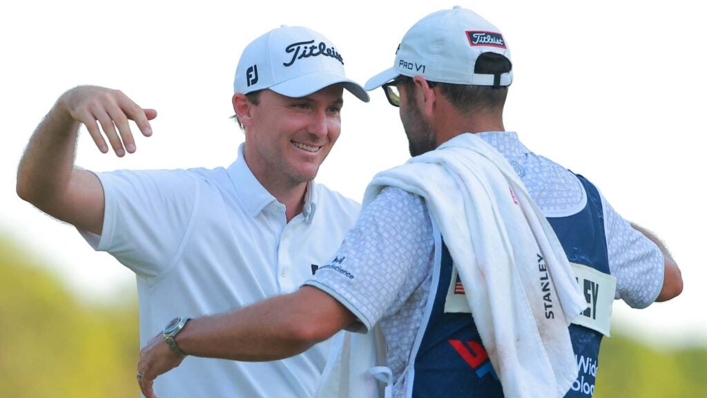 Russell Henley of United States celebrates with his caddie after winning the on the final round of the World Wide Technology Championship at Club de Golf El Camaleon at on November 06, 2022 in Playa del Carmen.