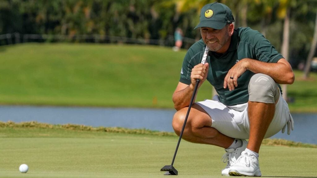 Team Captain Sergio Garcia of Fireballs GC lines up a putt on the 16th green during the semifinals of the LIV Golf Invitational - Miami at Trump National Doral Miami on October 29, 2022 in Doral, Florida