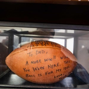A game ball from 2001, displayed in Tom Brady, Sr.'s office.
