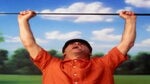 angry golfer holds club over head