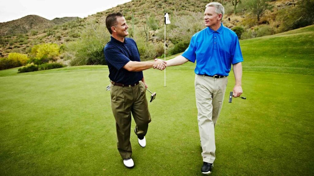 golfers shaking hands