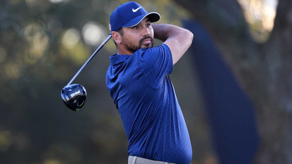 Jason Day hits drive during 2022 Houston Open