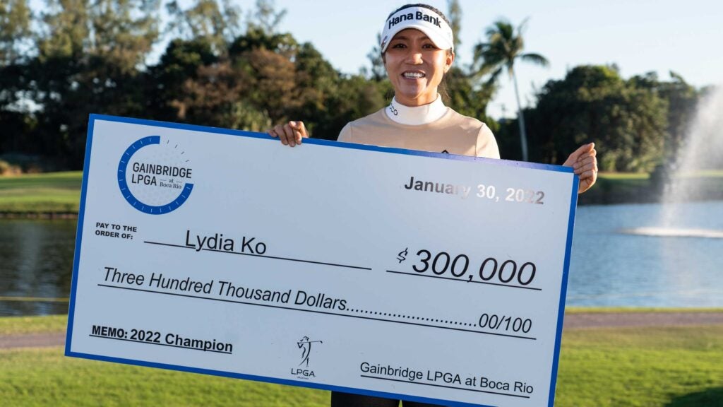 Lydia Ko (NZL) holds her winner's check after winning the Gainbridge LPGA on January 30, 2022, at Boca Rio Golf Club, in Boca Raton, FL. (Photo by Aaron Gilbert/Icon Sportswire via Getty Images)