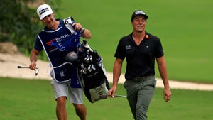 Viktor Hovland and caddie at 2021 World Wide Technology Championship