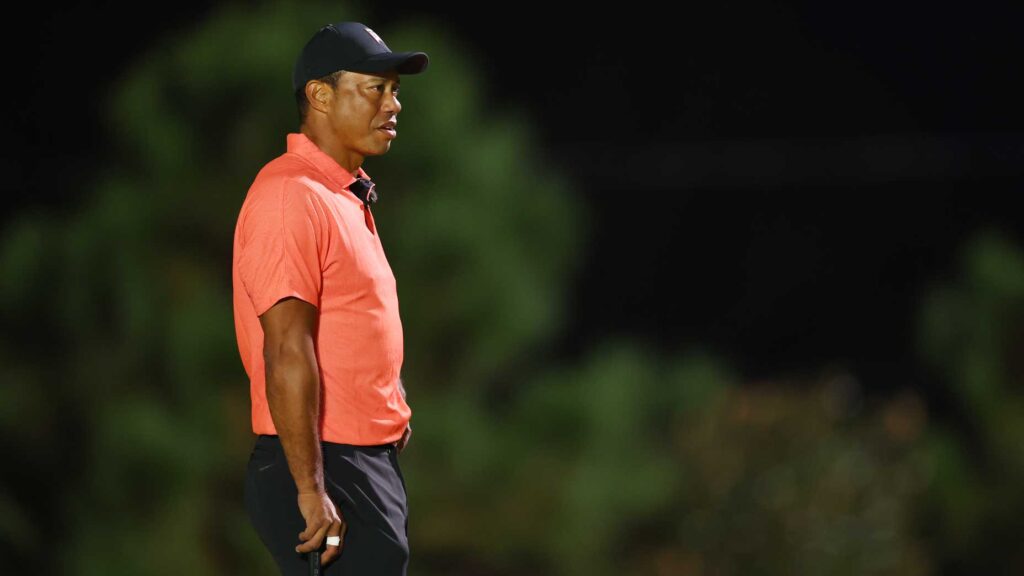 Tiger Woods watches the action at The Match in 2022