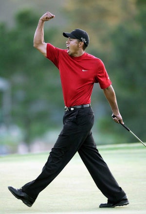 Tiger Woods of the US celebrates winning the 2005 Masters Golf Tournament Championship 10 April 2005 at the Augusta National Golf Club in Augusta, Ga. Woods defeated fellow American Chris DiMarco in a one-hole play-off.