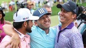 Abraham Ancer, Team Captain Sergio Garcia and Carlos Ortiz of Fireballs GC celebrate their team win and Eugenio Lopez-Chacarra's individual win on the 18th green during Day Three of the LIV Golf Invitational - Bangkok at Stonehill Golf Course on October 09, 2022 in Pathum Thani, Thailand.
